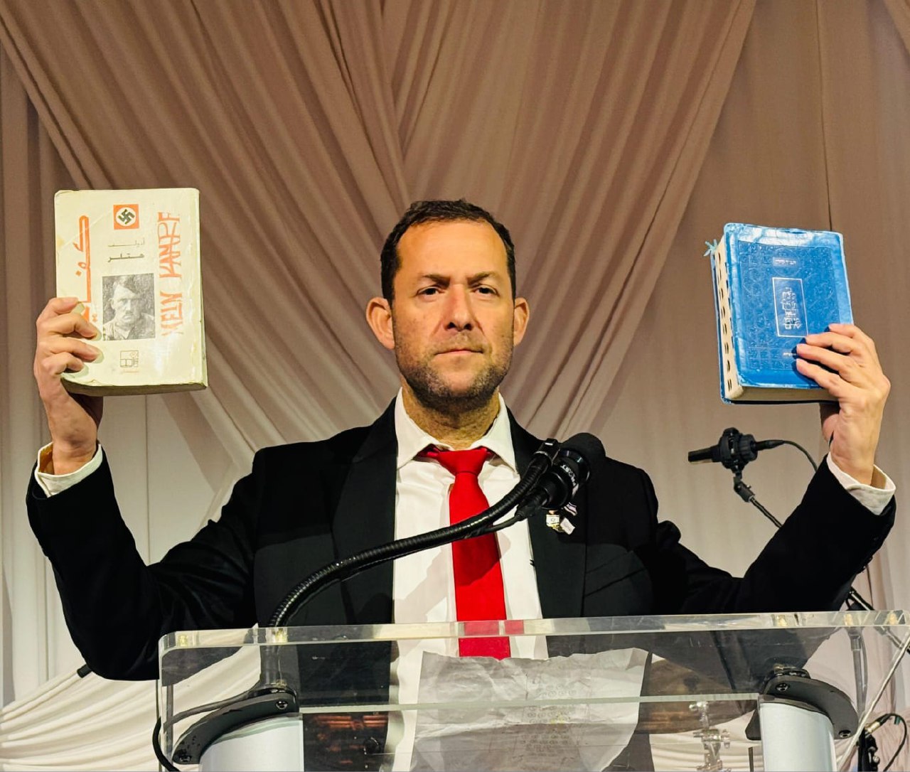 约西·达甘在佛罗里达州发表演讲时宣称：“他们的价值观是《我的奋斗》，我们的价值观是《圣经》。”此言一 ...